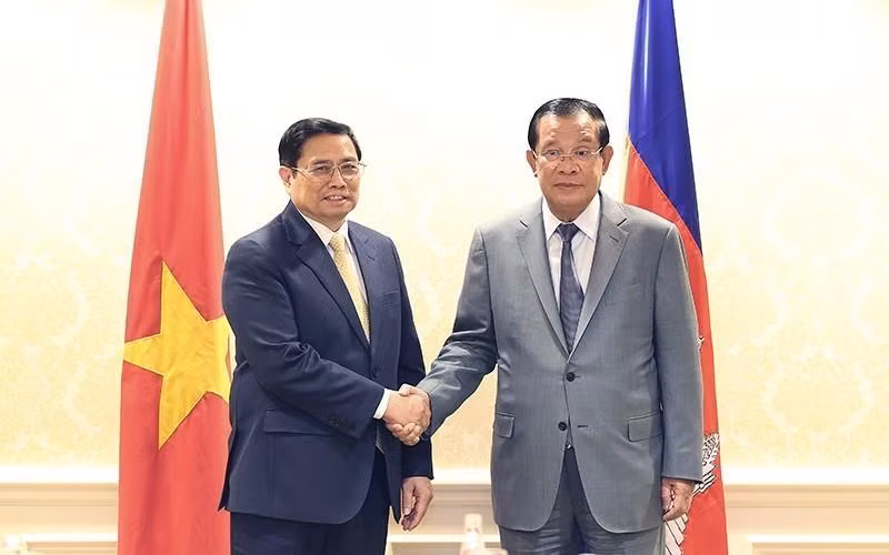 Le Premier ministre vietnamien Pham Minh Chinh et le Premier ministre cambodgien Hun Sen à l'occasion du sommet spécial ASEAN - États-Unis aux États-Unis en mai 2022. Photo : VNA. 
