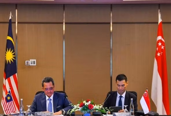 La 6e réunion du comité mixte sur la coopération en matière d'information et de communication se tient entre la Malaisie et Singapour le 3 février, soulignant l'importance de la numérisation. Photo : Facebook/KKD