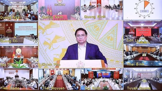  Le Premier ministre Pham Minh Chinh préside le 21 février la visio-conférence nationale sur le décaissement des fonds publics de l’année 2023 et la mise en œuvre du programme de relance et de développement socio-économique. Photo : VNA