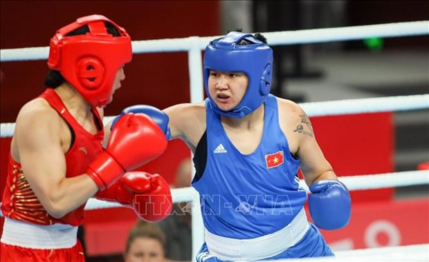 La boxeuse Luu Diêm Quynh (à droite) remporte la médaille de bronze pour le Vietnam. Photo: VNA