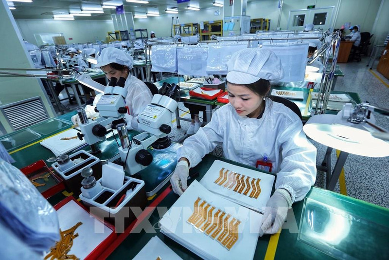 Dans une société sud-coréenne située dans la zone industrielle de Yên Phong, province de Bac Ninh. Photo : VNA.