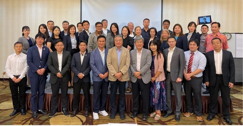Des délégués lors de la conférence au Vietnam de l’Association mondiale des nouilles instantanées. Photo : NDEL.