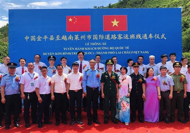 Délégués vietnamiens et chinois lors de la cérémonie. Photo: VNA