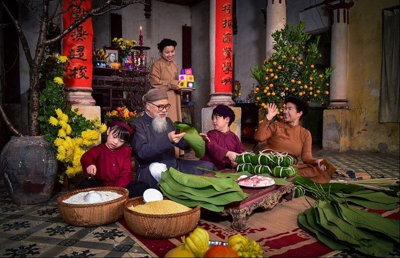 L'emballage de banh chung pour célébrer le Nouvel An lunaire. Photo: economictimes.vn