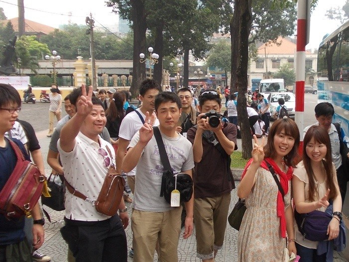 Des touristes japonais à Hô Chi Minh-Ville (au Sud du Vietnam). Photo : VOV.