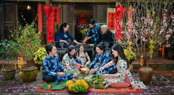 Le Têt est une bonne occasion pour réunir toute la famille. Photo : VNA.