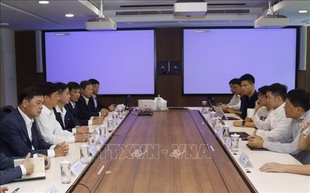 Le dialogue annuelle entre le ministère de la Sécurité publique du Vietnam et le ministère de l'Information et des Communications de Singapour, SNDGO et GovTech. Photo : VNA.