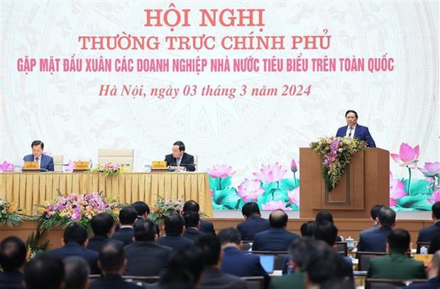 Le Premier ministre Pham Minh Chinh préside le 3 mars à Hanoï la Conférence de rencontre entre la Permanente du gouvernement et les entreprises publiques typique. Photo : VNA.