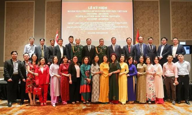 La cérémonie de célébration à Singapour. Photo: VNA