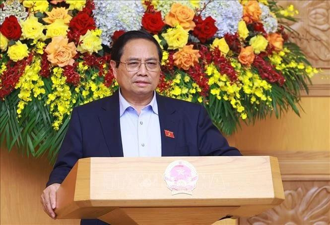 Le Premier ministre Pham Minh Chinh travaille à Hanoï avec le Conseil consultatif de politiques. Photo : VNA.