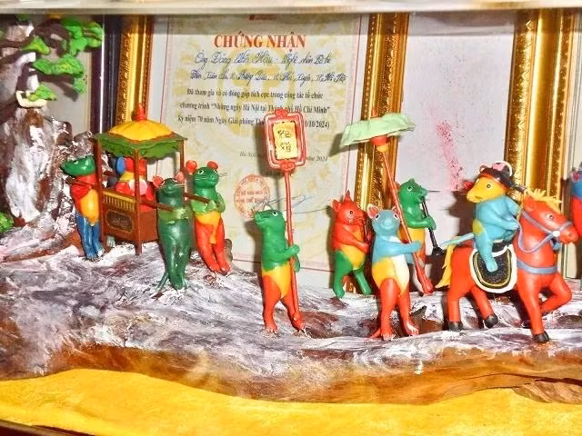 Des animaux en poudre en forme de personnages folkloriques vietnamiens. Photo : baoquocte.vn