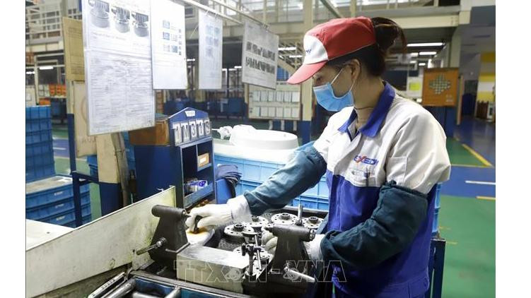 L’économie vietnamienne a enregistré des évènements positifs en 2022, reflétant sa stabilité et son développement. Photo : VNA.