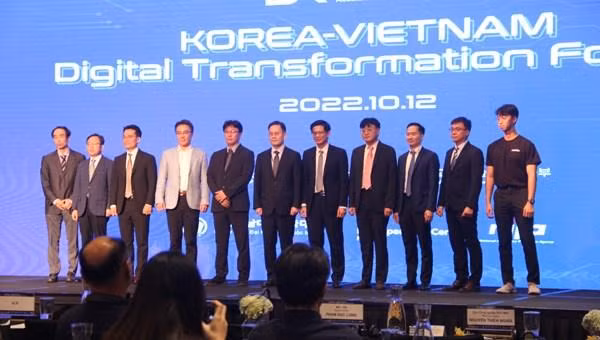 Des délégués au forum. Photo: VNA