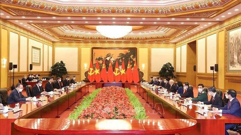 L’entretien entre le Secrétaire général du Parti communiste du Vietnam (PCV) Nguyên Phu Trong et le Secrétaire général du Parti communiste chinois (PCC) et Président chinois Xi Jinping. Photo : VNA