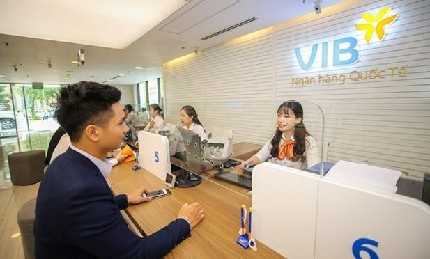 Dans une succursale de la Banque commerciale par actions internationale (VIB). Photo : VNA