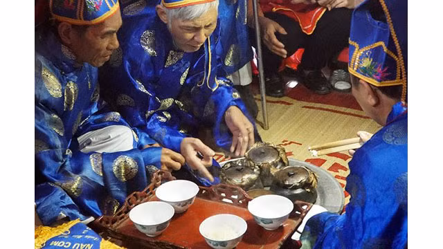 La fête de la cuisson du riz au village Thi Câm ảnh 12