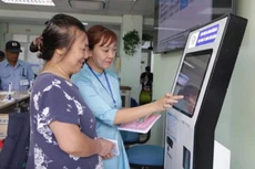 L'enregistrement des consultations et des traitements médicaux à l'hôpital de Dong Da, à Hanoï. Photo : NDEL.