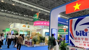 Stand du Vietnam dans un grand salon en Chine. Photo d'illustration.