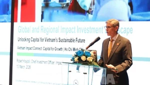 Robert Kraybill, directeur des investissements chez IIX, s'exprime lors du forum. Photo : VNA.