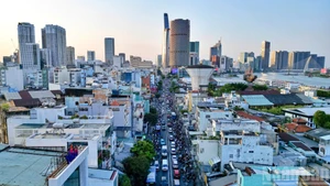 [Photo] Ho Chi Minh-Ville : le projet d’élargissement de l’axe Nguyen Tat Thanh pour fluidifier la circulation