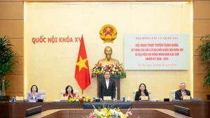 Tran Thanh Man, président de l’Assemblée nationale et du Conseil électoral national, préside cette conférence. Photo : NDEL.