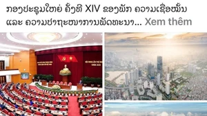 L'article "XIVe Congrès du Parti : Foi et aspiration au développement" paru dans le journal Pasaxon. Photo : VNA.