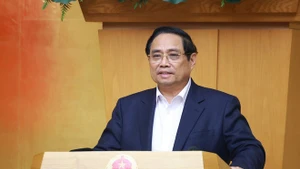 Le Premier ministre Pham Minh Chinh s'exprime lors de la réunion. Photo : VNA.