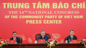 Le secrétaire général du Parti To Lam (centre) lors de la conférence de presse internationale sur les résultats du XIVe Congrès national du Parti, à Hanoï, le 23 janvier. Photo : Dang Khoa.