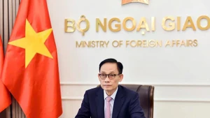 Le Hoai Trung, membre du Bureau politique et ministre des Affaires étrangères du Vietnam. Photo: Tuoitre.