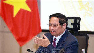 Le Premier ministre Pham Minh Chinh préside la réunion. Photo : VNA.