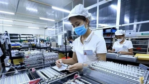 L'adoption de l'IMM permet au Vietnam de conserver les investisseurs et de concrétiser son objectif d'améliorer la qualité des flux de capitaux à l'avenir. Photo : VNA.