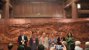 "Convergence du patrimoine" des villages d'artisans des anciennes capitales au Temple de la Littérature