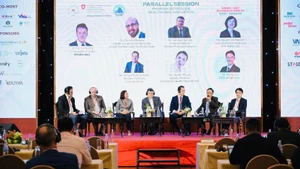 Des représentants d’entreprises et de partenaires internationaux participent au Forum économique Suisse - Vietnam 2025. Photo : NDEL.