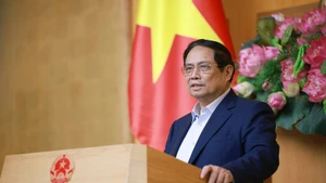 Le Premier ministre Pham Minh Chinh lors de la réunion, à Hanoï, le 9 juillet. Photo : VNA.