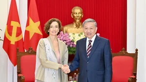 Le secrétaire général du Parti, To Lam et Audrey Azoulay, directrice générale de l'UNESCO. Photo: NDEL.