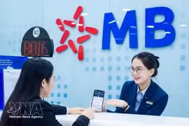 Vietnam Report dévoile le classement des 50 entreprises publiques les plus prestigieuses et performantes pour 2026, dont MBBank. Photo : VNA.