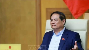 Le Premier ministre Pham Minh Chinh s'exprime lors de la réunion. Photo : VNA. 