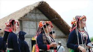 Femmes Dao Quân Chet en costume traditionnel. 