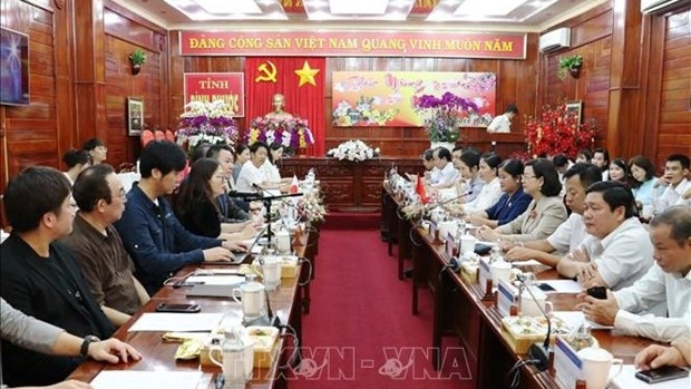 Séance de travail entre les autorités de la province de Binh Phuoc et la délégation japonaise. Photo : VNA.