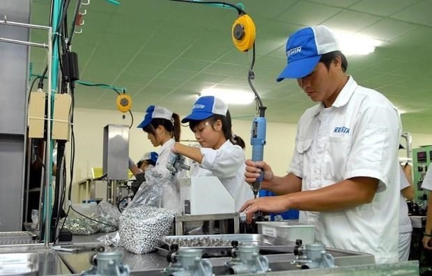 Les travailleurs dans le parc industriel de Thang Long II dans la province de Hung Yen. Photo : VNA.