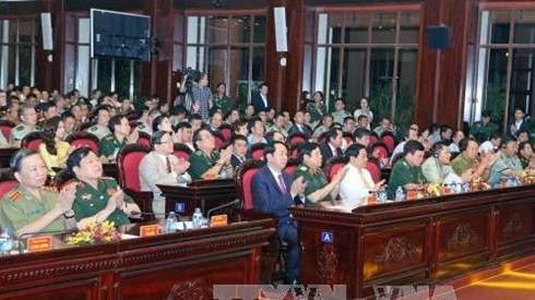 Le Président de la République, Trân Dai Quang, assiste au programme «Amitié des zones frontalières». Photo: NDEL.