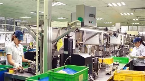 L'un des grands avantages actuels du Vietnam est la capacité de production de son industrie de haute technologie qui est accélérée par une main-d'œuvre jeune et hautement qualifiée. Photo : VNA.