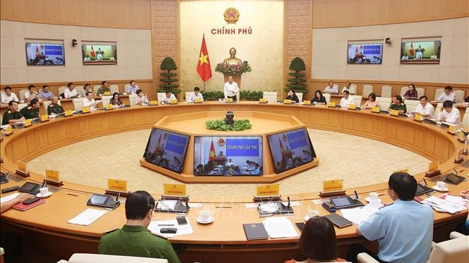 Le vice-Premier ministre permanent, Truong Hoa Binh, prend la parole lors de la réunion. Photo : VNA.