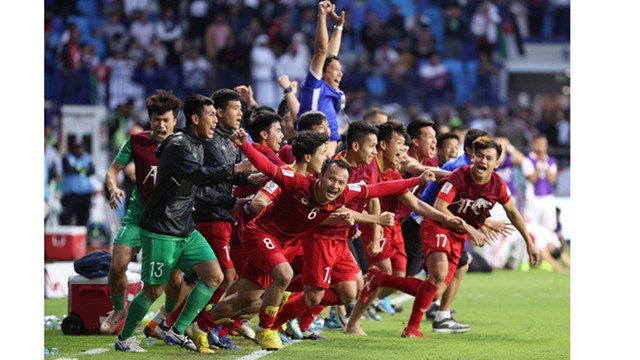 L’équipe vietnamienne est devenue la première à être présente aux quarts de finale de l’ASIAN Cup 2019. Photo : News1.