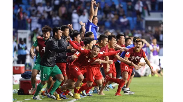 L’équipe vietnamienne est devenue la première à être présente aux quarts de finale de l’ASIAN Cup 2019. Photo : News1.