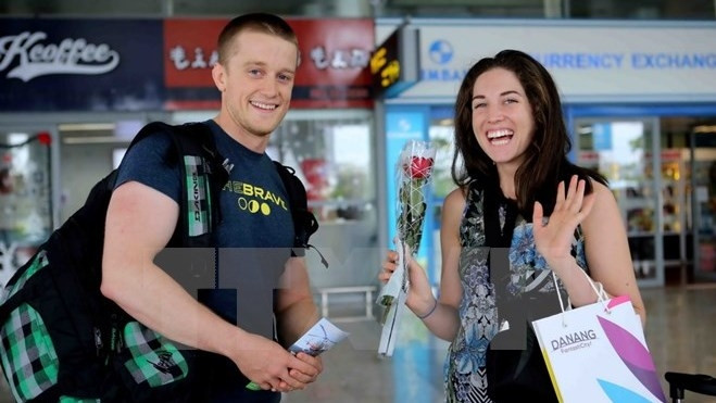 Les touristes étrangers au Vietnam. Photo: VNA.