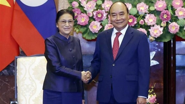 Le Président du Vietnam, Nguyên Xuân Phuc, et la Vice-Présidente du Laos, Pany Yathotou, en visite officielle au Vietnam. Photo : VNA.