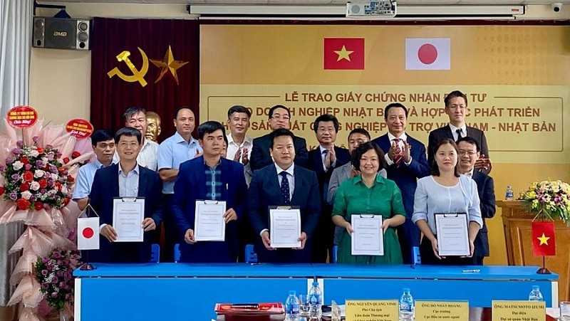Lors de la cérémonie de signature d’un accord de coopération. Photo: congthuong.vn