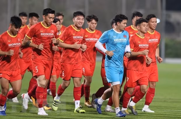 Des membres de l'équipe vietnamienne lors d'un entraînement. Photo : VNA.