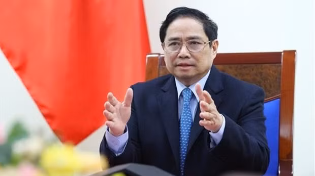 Le Premier ministre vietnamien, Pham Minh Chinh, s’est entretenu au téléphone, jeudi 13 janvier, avec son homologue chinois Li Keqiang. Photo : VNA.